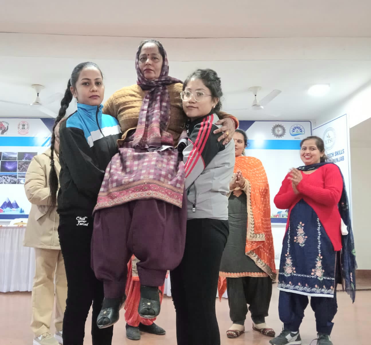 On the 6th day of the Apada Mitra training camp, the patient was trained in lifting and shifting
